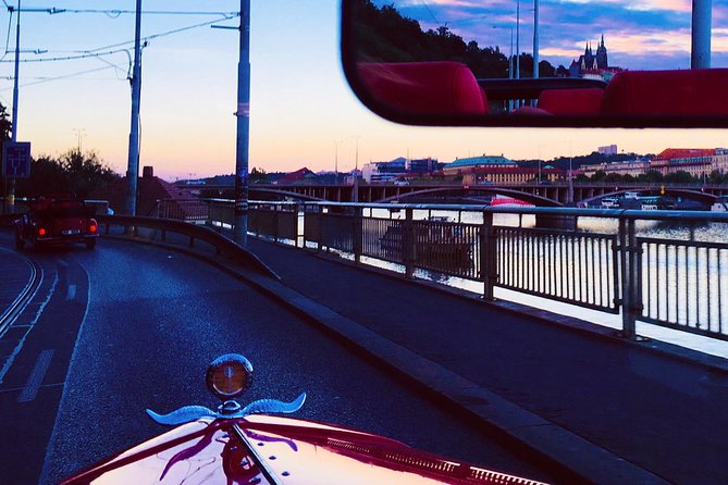 1,5 hour oldtimer convertible Prague sightseeing tour - Wenceslas Square, National Museum, and the theatre rooflines