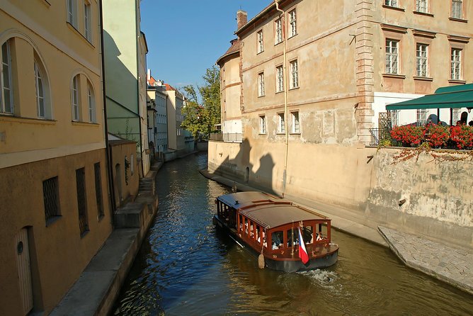 Best of Prague Private Walking Tour (Left and Right Riverbank) - Lennonova zeď and the quiet courage of art
