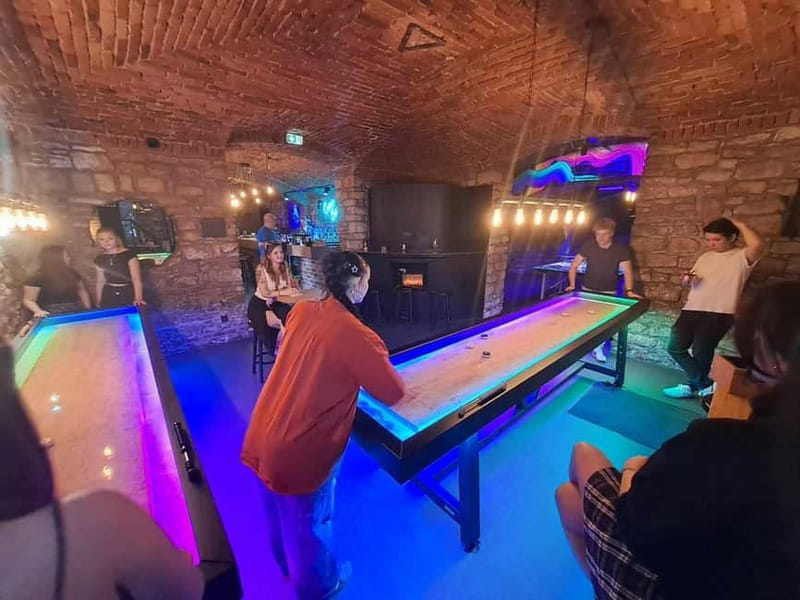 Crew Bar Prague: Open bar, ping pong or shuffleboard game - Your 60 Minutes: UV Ping Pong or Shuffleboard