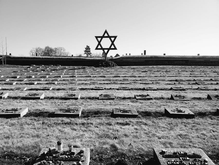 From Prague: Terezin Camp and Bohemian Switzerland Day Trip - Bohemian Switzerland park time: guided walking and big nature moments