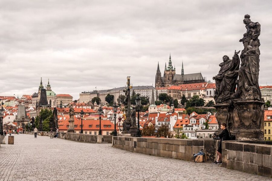 Prague: 6-Hour Tour with River Boat Cruise and Lunch - Tram up toward the Castle District, where Hradcany comes into view
