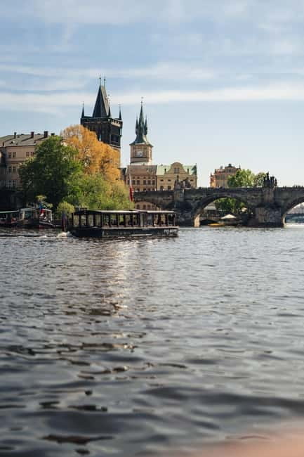 Prague: Canal Cruise Around Charles Bridge - National Theatre and the Vltava view that feels calmer