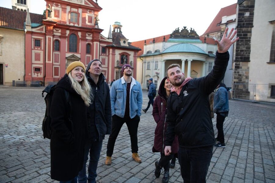 Prague: Castle Grounds & Highlights Walking Tour small-group - Old Royal Palace exteriors and St. George Basilica stops that give you context