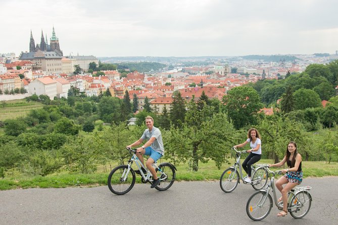 Prague E-Bike City Tour with A Local Guide - Comfort and safety: helmets, rain gear, and cobbles