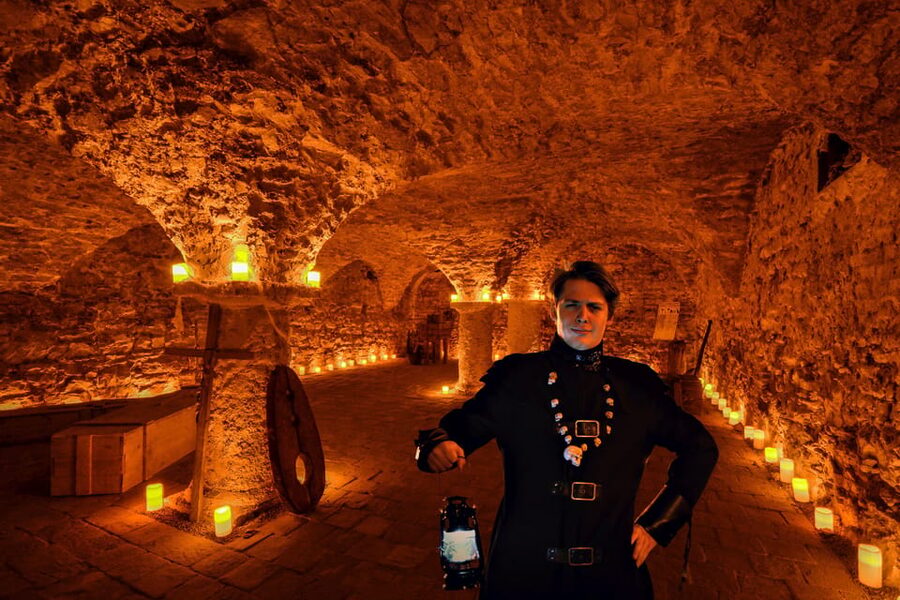 Prague: Ghosts, Legends, Medieval Underground & Dungeon Tour - The Medieval Underground Stops: Plague Doctor, Flood Memories, and Life Then