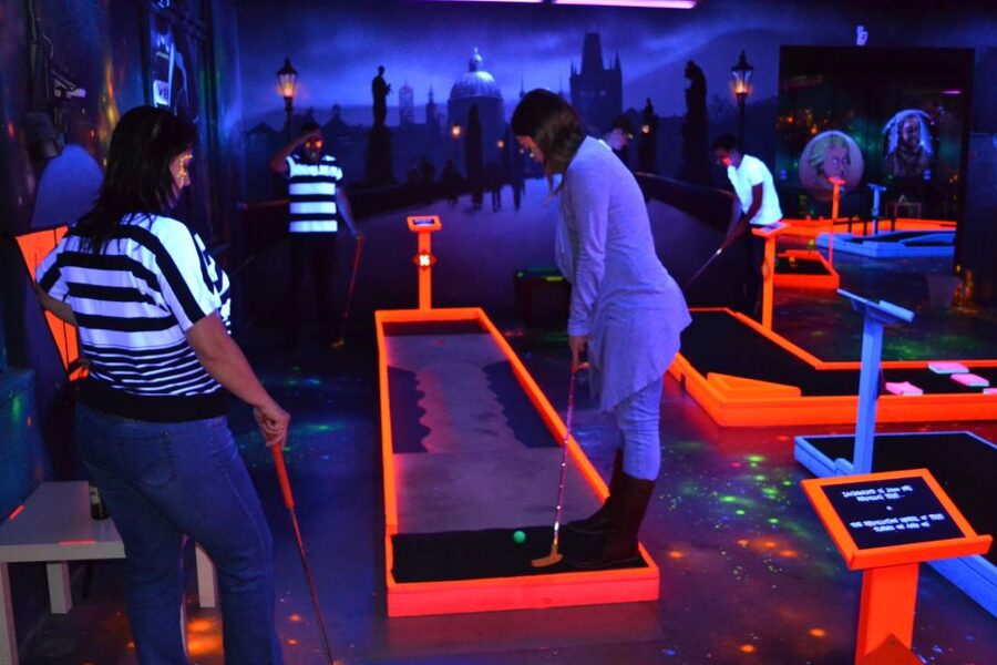 Prague: Glow Golf Mini Golf Game by UV Light - Jenga, Pukec, and the Games That Keep the Group Smiling
