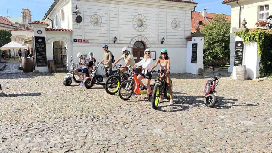 Prague: Highlights Tour on e-Scooter or eBike - Kafka Museum peeing statues and public art that breaks the usual rules