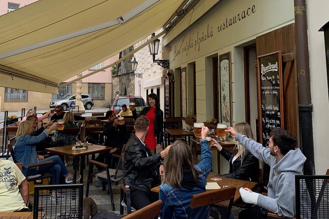 Prague Historic Pub Tour with Drinks Included - Old Town Square to Charles Bridge: Film Locations, Cobblestones, and Another Drink