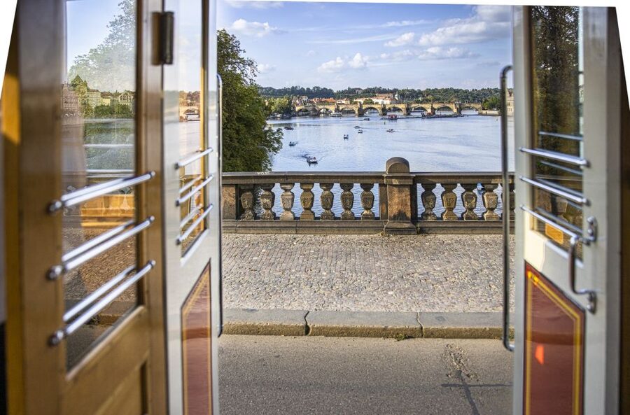 Prague: Hop-on Hop-Off Historical Tram Ticket for Line 42 - What you actually get on board: audio guide app, brochure, and crew help