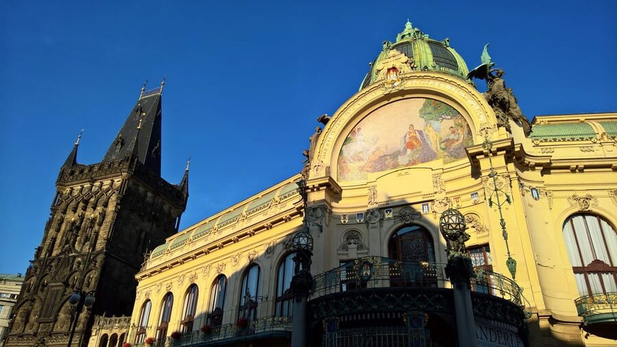 Prague: Old Town Guided Walking Tour and City Boat Ride - The Vltava cruise: headset stories, photos of Prague Castle, and a calmer pace