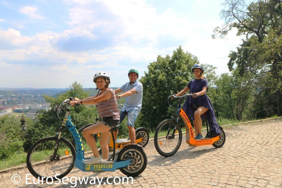 Prague: Tour by Electric Scooter or Cruiser eBike - Prague’s narrowest alley, Kafka stops, and the quieter side of the center