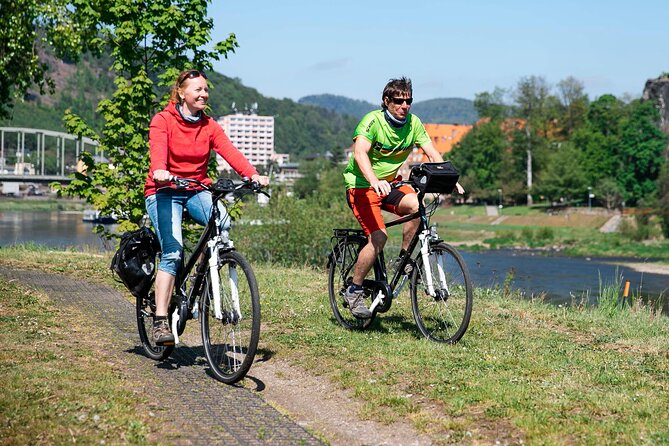 Rafting from Děčín to Bad Schandau and back on bikes - Bad Schandau handover: swapping boats for bikes at the ferry-and-station area