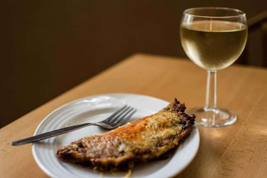Secret walking Food Tour Prague - Hidden courtyard Czech wine, marinated cheese, and pickled sausage